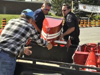 Moving carts to the top of the hill